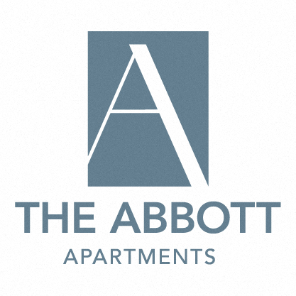 a logo for the abbot apartments